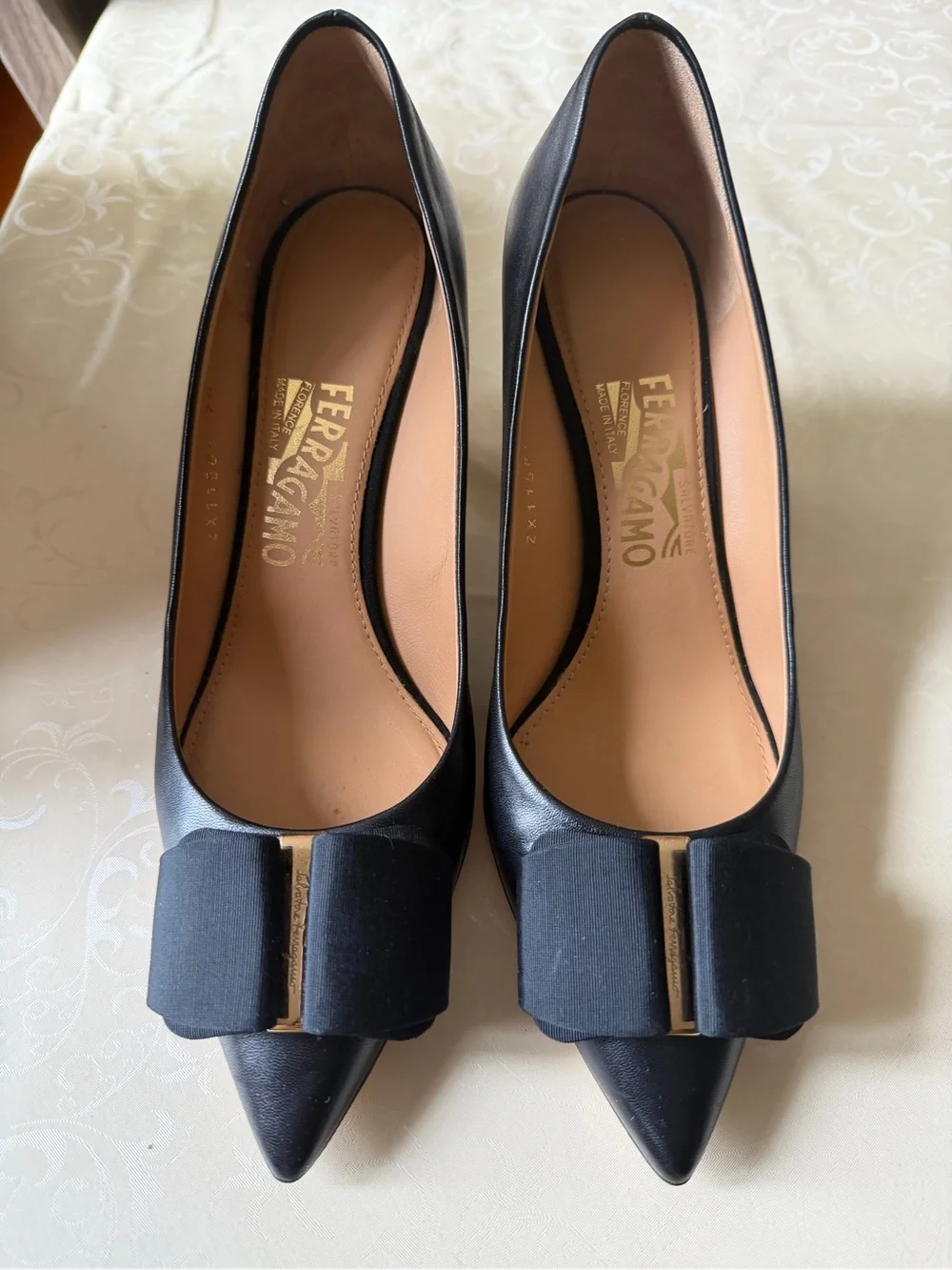 Salvatore Ferragamo Black Pointed Toe Pumps with Vara Bow and Gold Accent